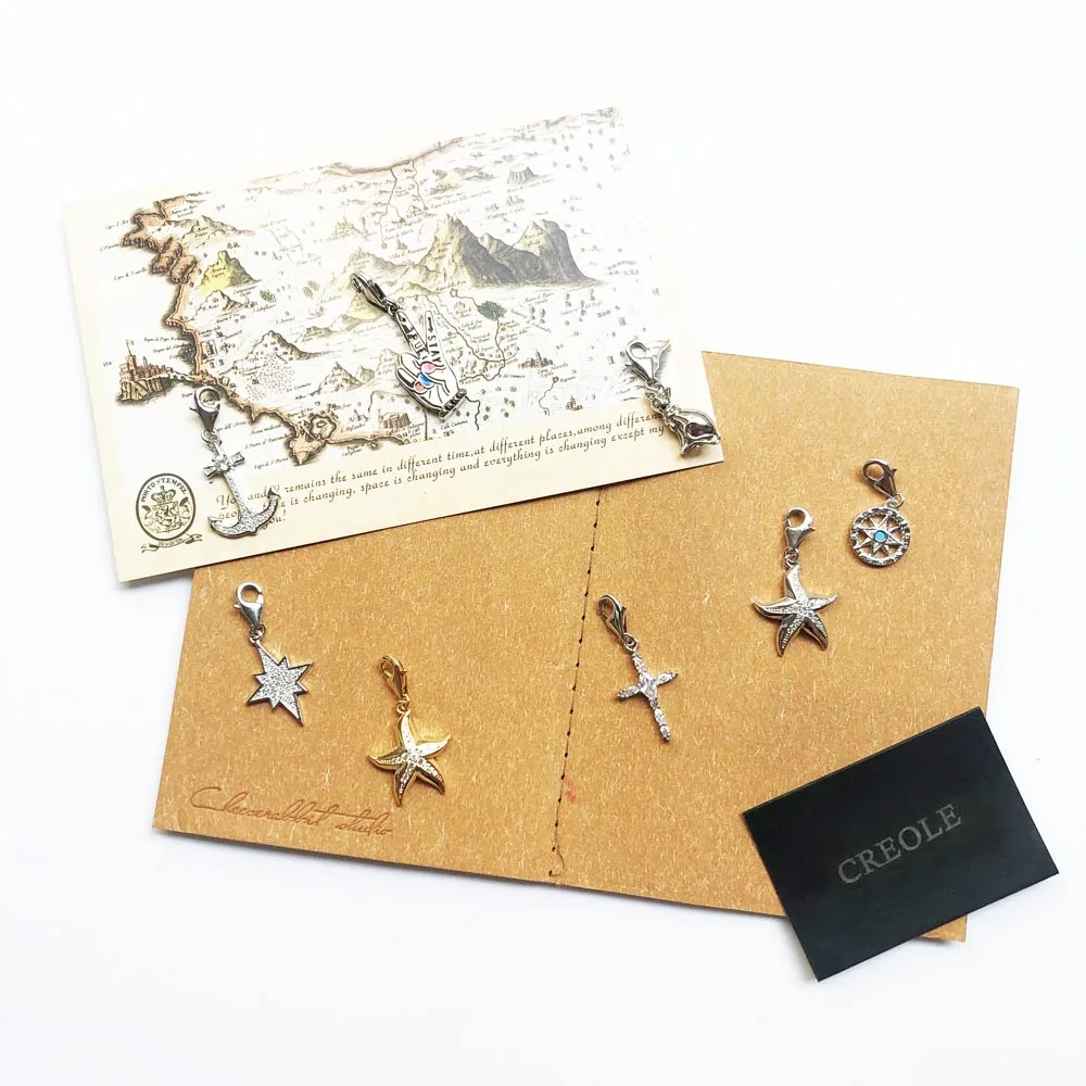 Подвеска с крестом в виде сиамского кота якоря и морской звезды серебро 2019