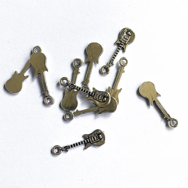 

10pcs /Lot 24x8mm Mini Guitar Charms Tibetan Silver Color Pendant For Making Fit DIY Earring Jewelry Handmade Accessories Crafts
