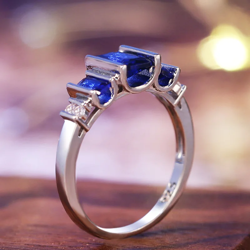 

Huitan Blue Zircon -Ring With Triple Cubic Zircon Crystal Stone Anniversary Present Ring For Wife Silver Plated Party Midi Ring