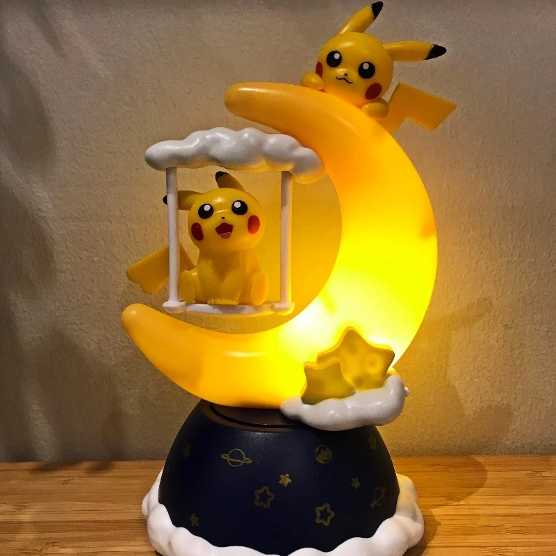 

Pokemon Jigglypuff Pikachu Star Moon Streamer Music Box Psyduck Eevee Squirtle Movable Sound and Light Toy Gift Model Figure