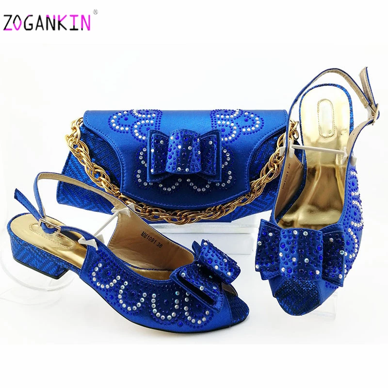 Комплект из туфель и сумочки красного коричневого цвета в африканском стиле