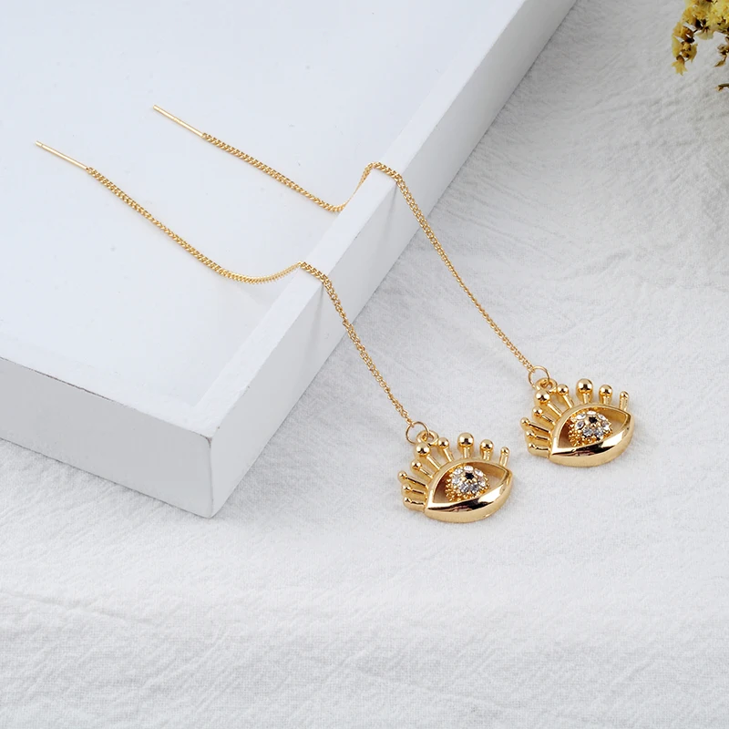 Женские серьги золотого цвета с длинной тонкой цепочкой уникальные кристаллами