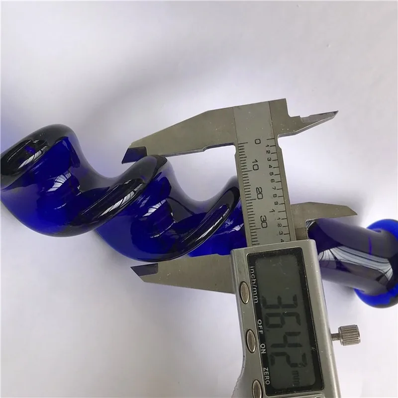 Стеклянный фаллоимитатор в форме спирали насыщенного синего цвета прозрачная