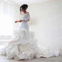 mermaid wedding dresses lace applique sheer jewel neck long sleeves ruffles tiered skirts chapel train button back bridal gowns