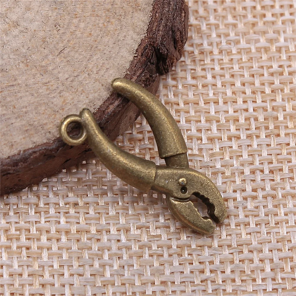 

free shipping 29pcs 25x12mm antique bronze pliers charms diy retro jewelry fit Earring keychain hair card pendant accessories