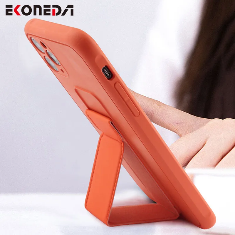 

EKONEDA Folded Wrist Strap Case For iPhone XR X 11 12 Pro XS Max 6S 7 8 Plus Case Plain Car Phone Holder Stand Cover