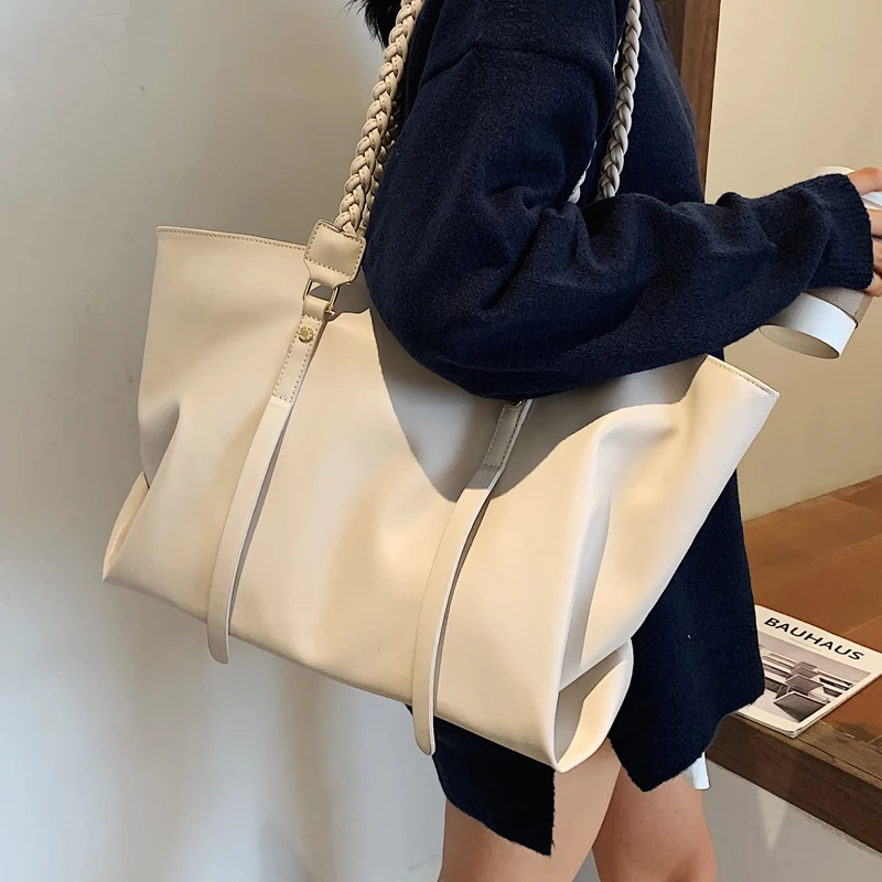 

Large-capacity explosive bags 2021 new summer fashion woven portable handbag shoulder armpit joker tote bag