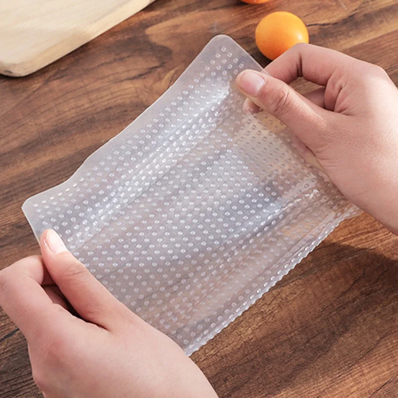 

Food-grade Silicone Transparent Non-slip Reusable Sealed Plastic Wrap .