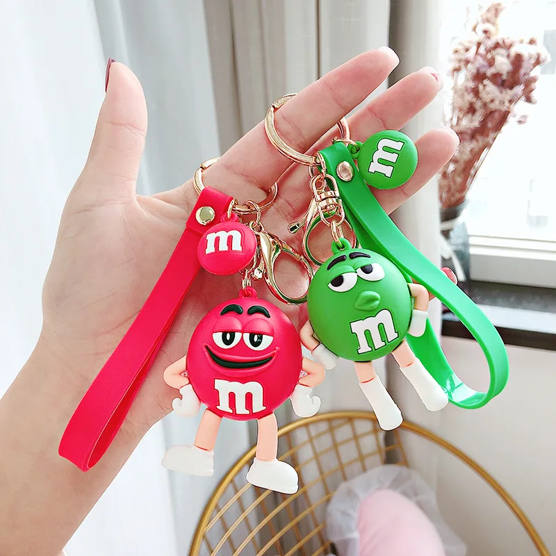 

Мультяшный M Bean Keychian на рюкзаке, милая шоколадная игрушка, кукла, силиконовая Подвеска для мужчин, женщин, детей, сумка, автомобильный брелок,...