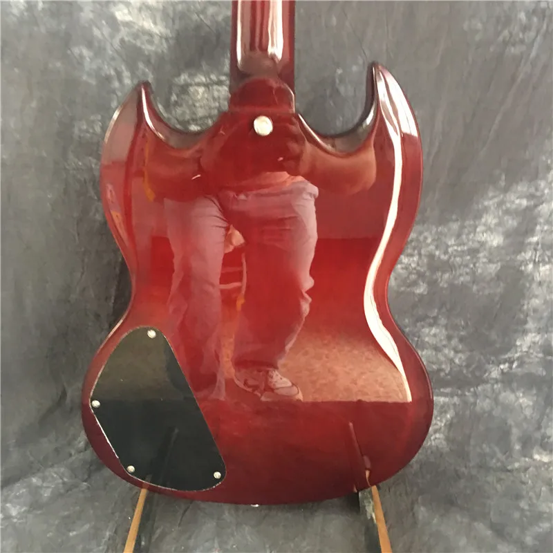 

High-quality electric guitar, Tune-O-Matic bridge, wine red,