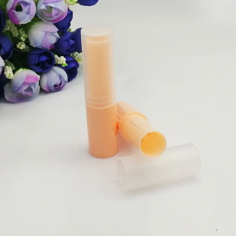Оранжевый 50pcs plastic lip balm tube Slender cylindrical Lipstick tube rotating Directly filled with frosted lid White yellow red pink - Цвет: Оранжевый