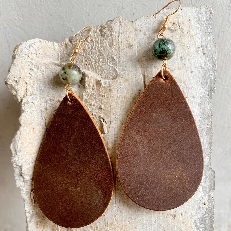 

Серьги-подвески женские из натуральной кожи с круглыми камнями