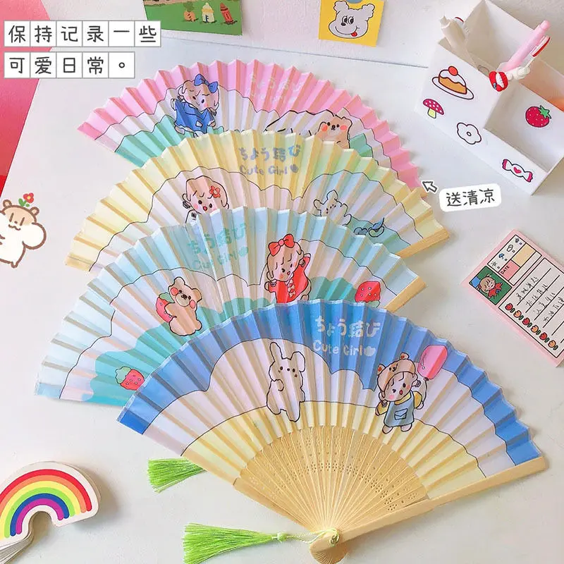 

Japanese Korean Small Bamboo Fan Ins Kawaii Student Ancient Style Tassel Summer Carry Folding Fan Girls Wedding Gifts 2021