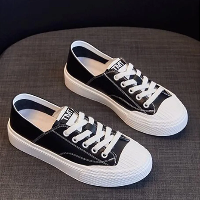 Женские кроссовки из натуральной кожи на шнуровке белые вулканизированной