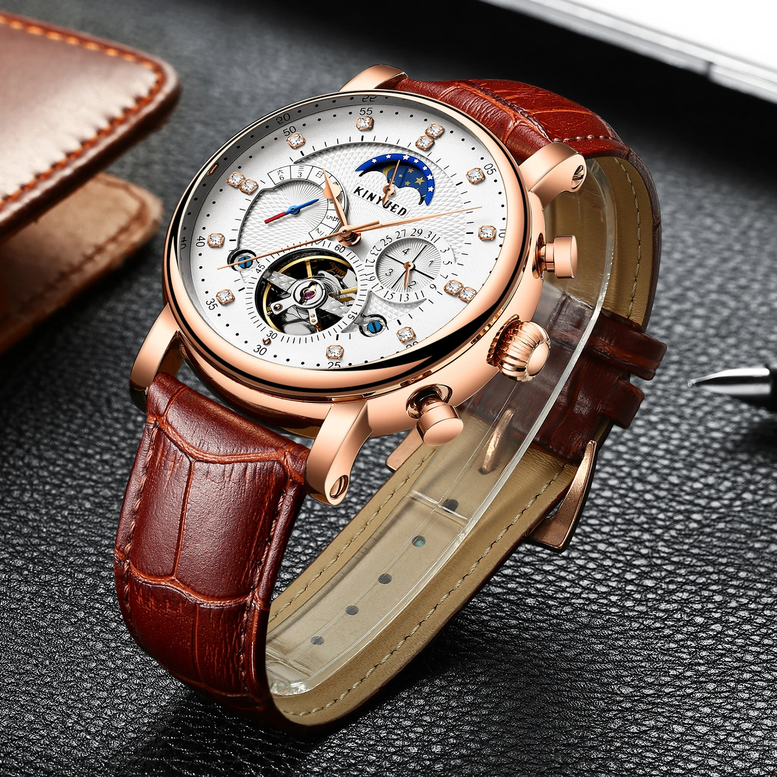 

Top Brand KINYUED Mechanical Automatic Watch Men Tourbillon Luxury Rhinestone Gold Watches Moon Phase Skeleton Relogio Masculino