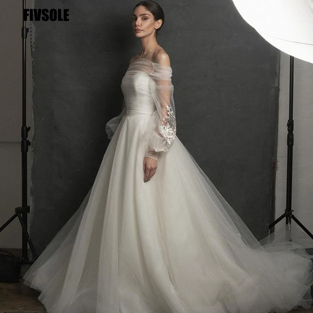 Свадебное платье с длинным рукавом-фонариком со шлейфом