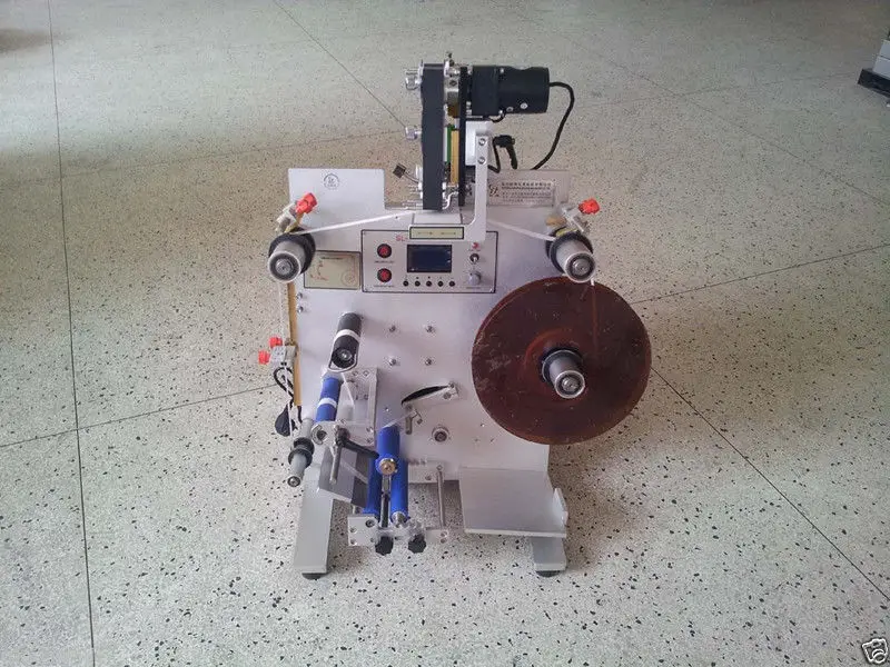

SL-130 automatic round bottle labeling machine plus coding machine ATT
