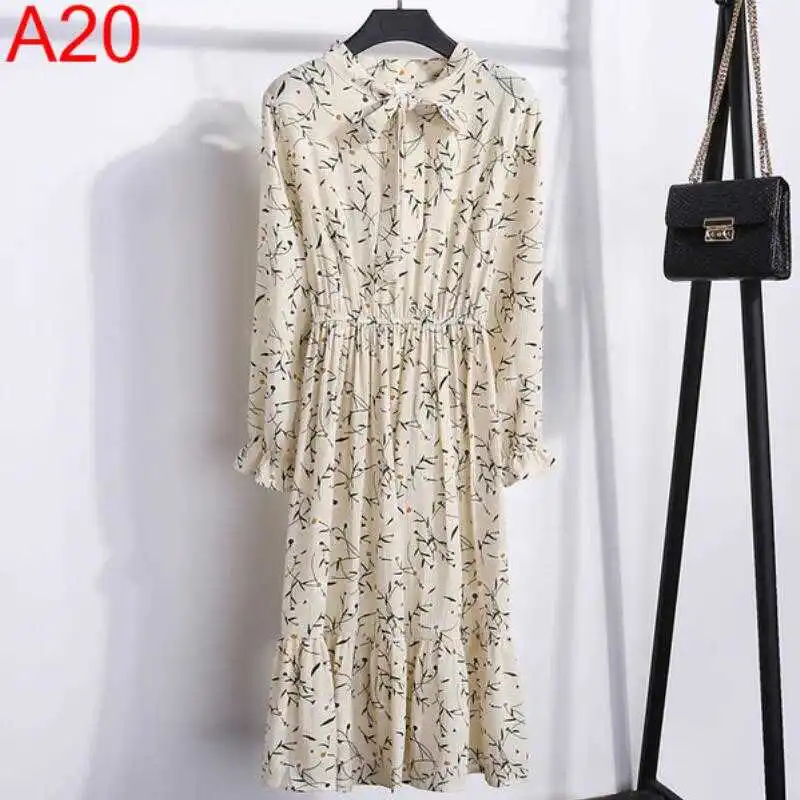 

Casual woman dressed in autumn vintage Korean floral style chiffon shirt dressed in long sleeve midi bow dress in summer