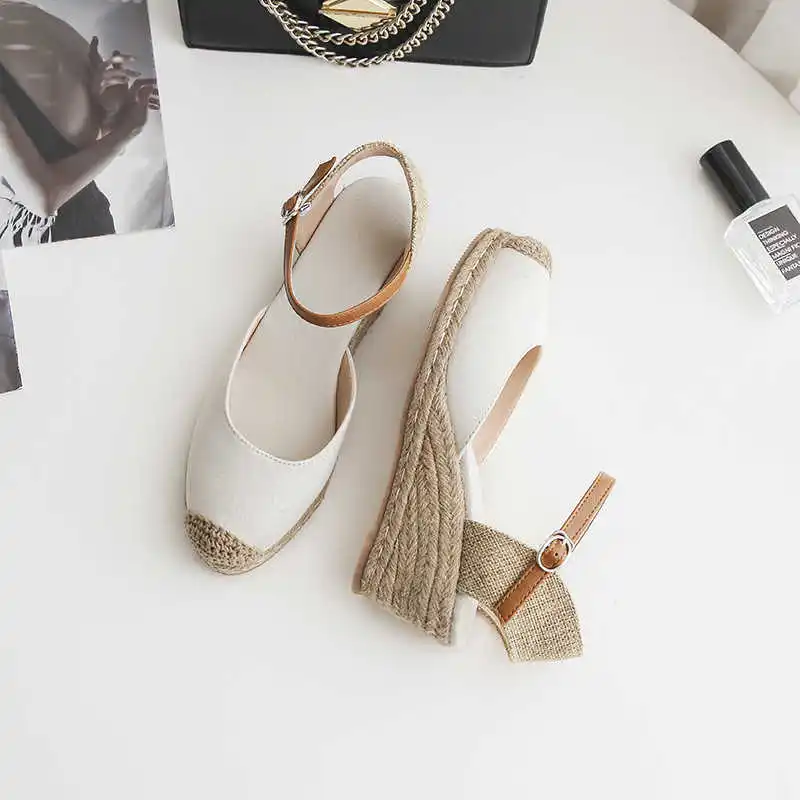 

2021 summer new Baotou sandals women's slope heel cotton hemp straw high heeled shoes