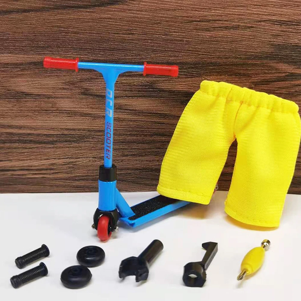 

Kids Mini Alloy Finger Scooter Model Set with Pants Spare Wheel Interactive Finger Skateboard Toy Children Sensory Activity Toys