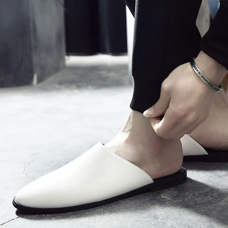 

Slipper men's summer tide drag a lazy half-dragging casual head without heeled leather cool drag British men's sandals casual