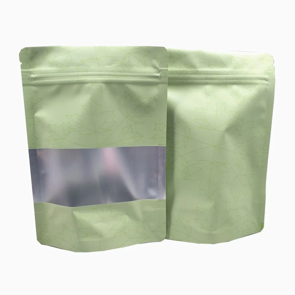 

50Pcs/Lot Green Mylar Foil Zip Lock Stand Up Bag Matte Clear Window Maple Leaf Printed Reclosable Reusable Food Bean Pouches