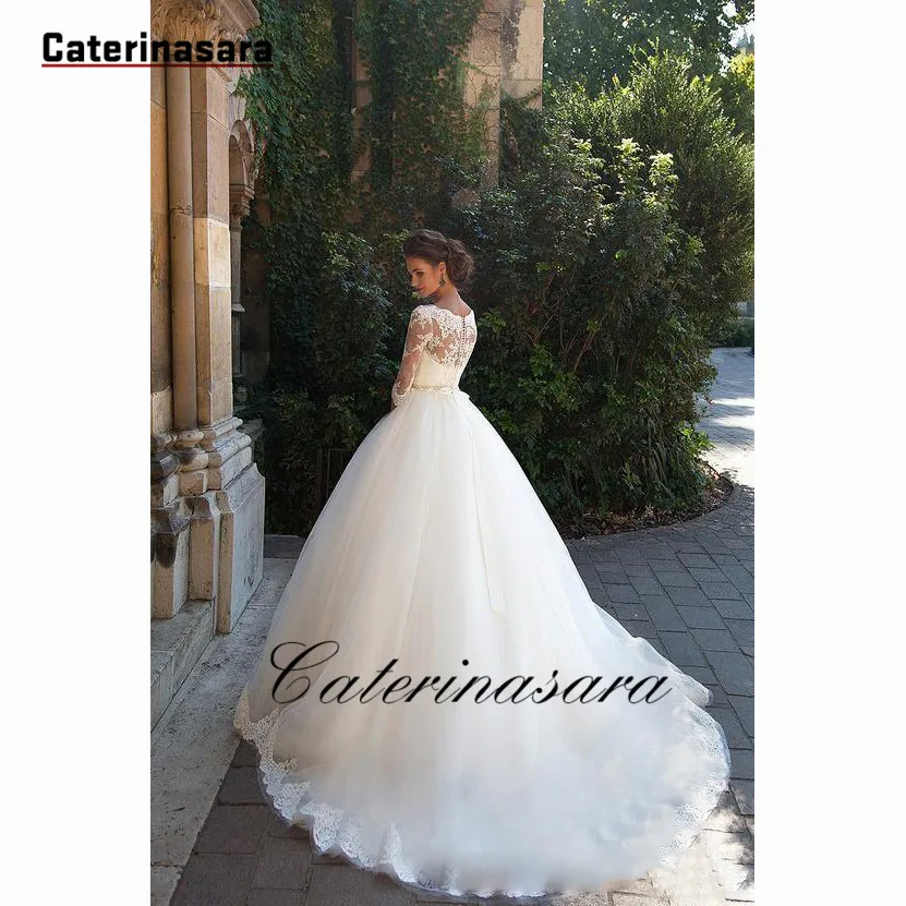 Кружевное свадебное платье цвета слоновой кости со стразами поясом тюлевым