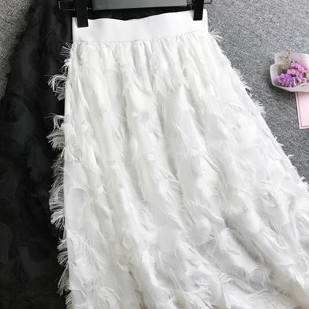 Женская Стильная однотонная эластичная юбка с высокой талией и кисточками