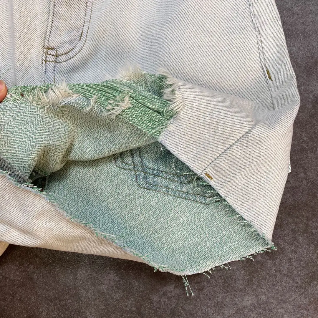

ZCSMLL 2021 summer ripped raw edge pocket label decoration Korean version of the old washed mid-waist denim shorts tide