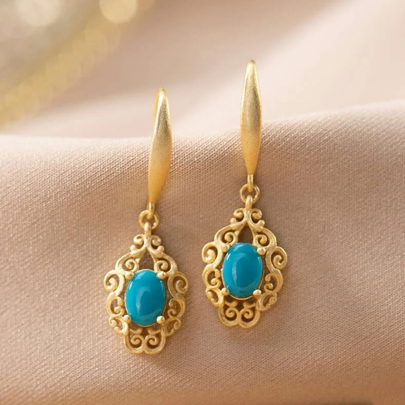 

New retro hollow flower electroplating gold color retro turquoise earrings female earrings