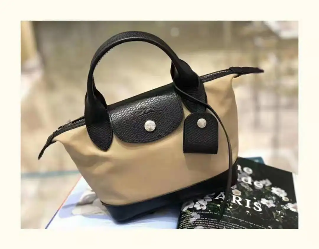 

2021 new Longxiang cowhide stitching dumpling bag shoulder messenger handbag ladies small bag
