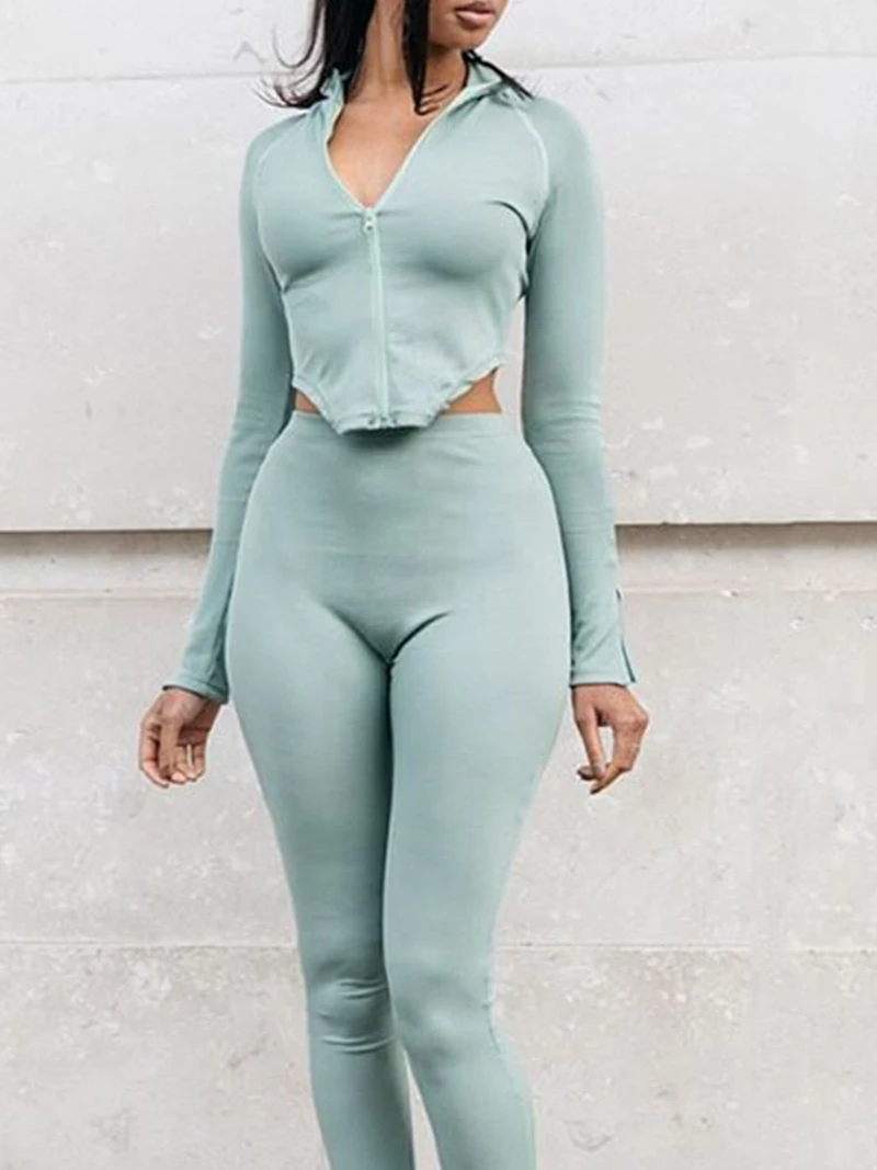 

Women's polyester solid color sports fitness two-piece long-sleeved zipper top sexy tight stretch pants S9K0906