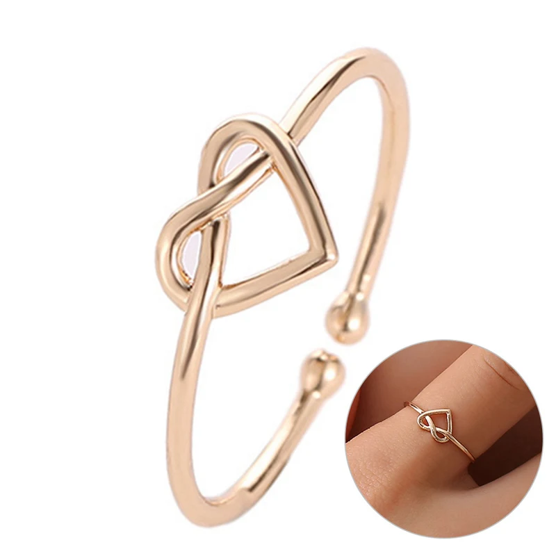 Новый узел сердца кольца для мужчин и женщин Цвет золотистый серебристый черный