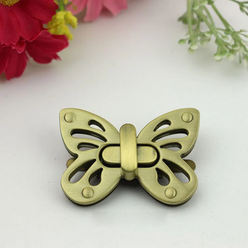 

10 Pcs/ Lot Butterfly Twist Turn Lock for Handbags, Bags DIY Gold, Silver, Gun Black, Bronze Metal Bag Lock Closure Hardware