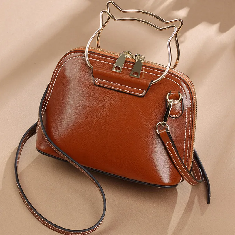 

New European American Luxury Oil Waxed Cowhide Sweet And Elegant Shell Handbag Purple/Black Business/Leisure/Trave Women's Bag