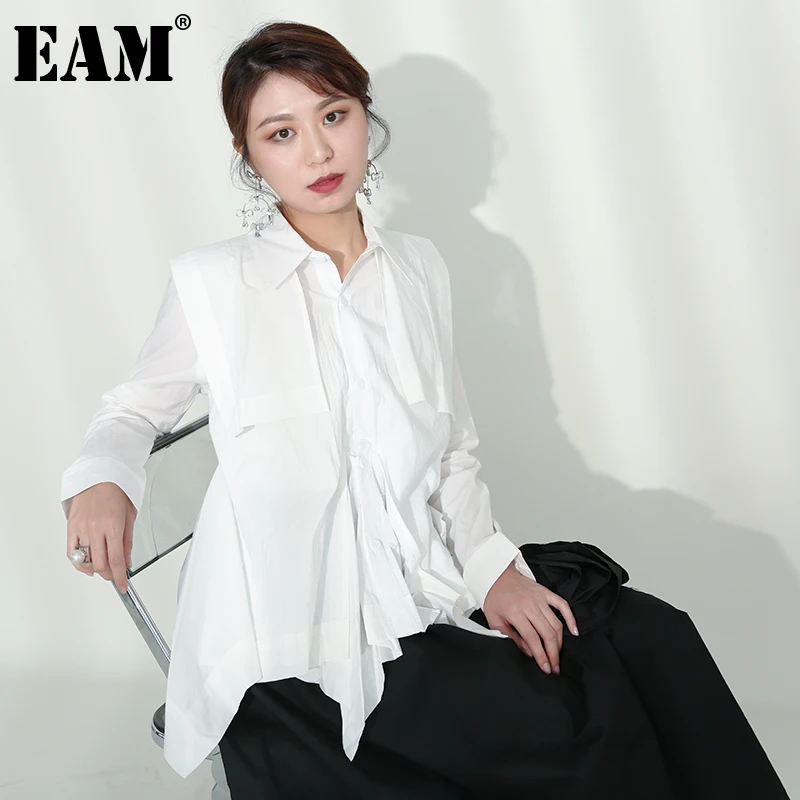 

[EAM] Женская белая блузка с асимметричным подолом и оборками, новая свободная рубашка с отворотом и длинным рукавом, модная весенне-осенняя ...