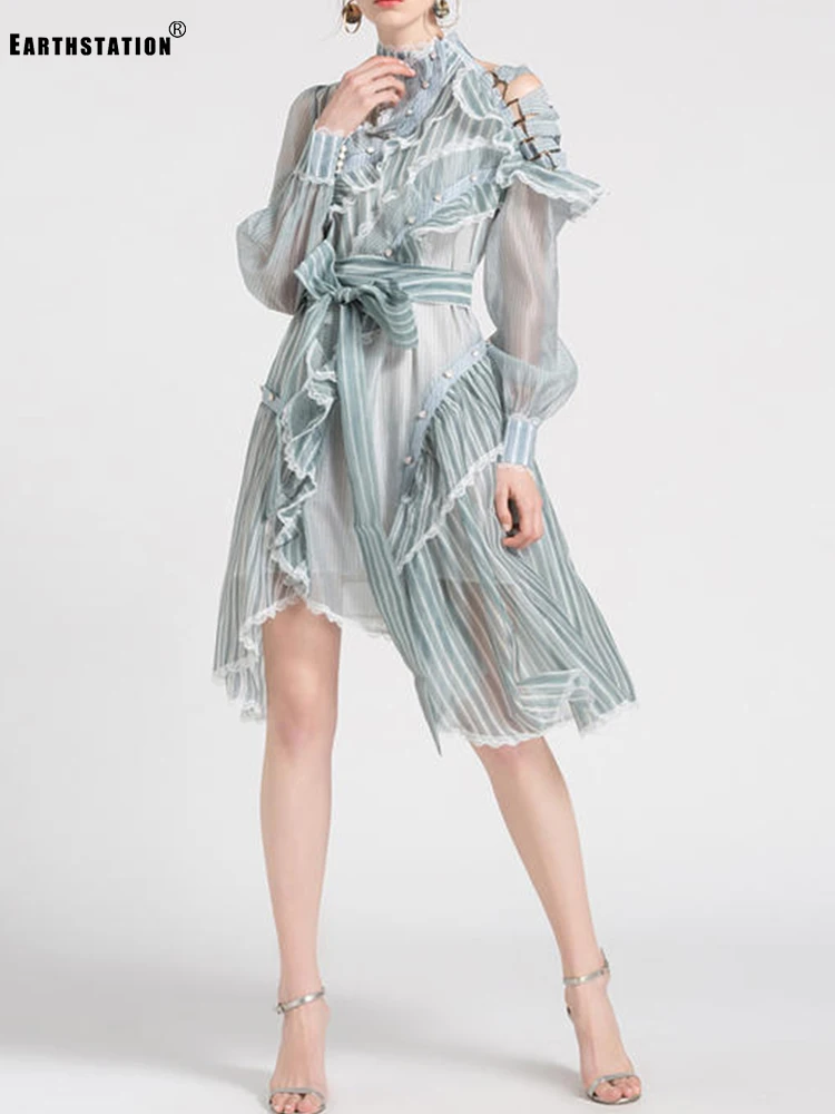 

Free shipping Heavy crafts Appliques Frills Buttons Leaky shoulder straps Irregular striped dress Women's autumn new fashion