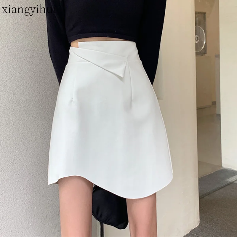 

Plus Size 3XL 4XL Vintage High Waist Asymmetric Pu Leather Skirt Women Autumn 2021 New Korean Fashion White Faux Leather Skirts