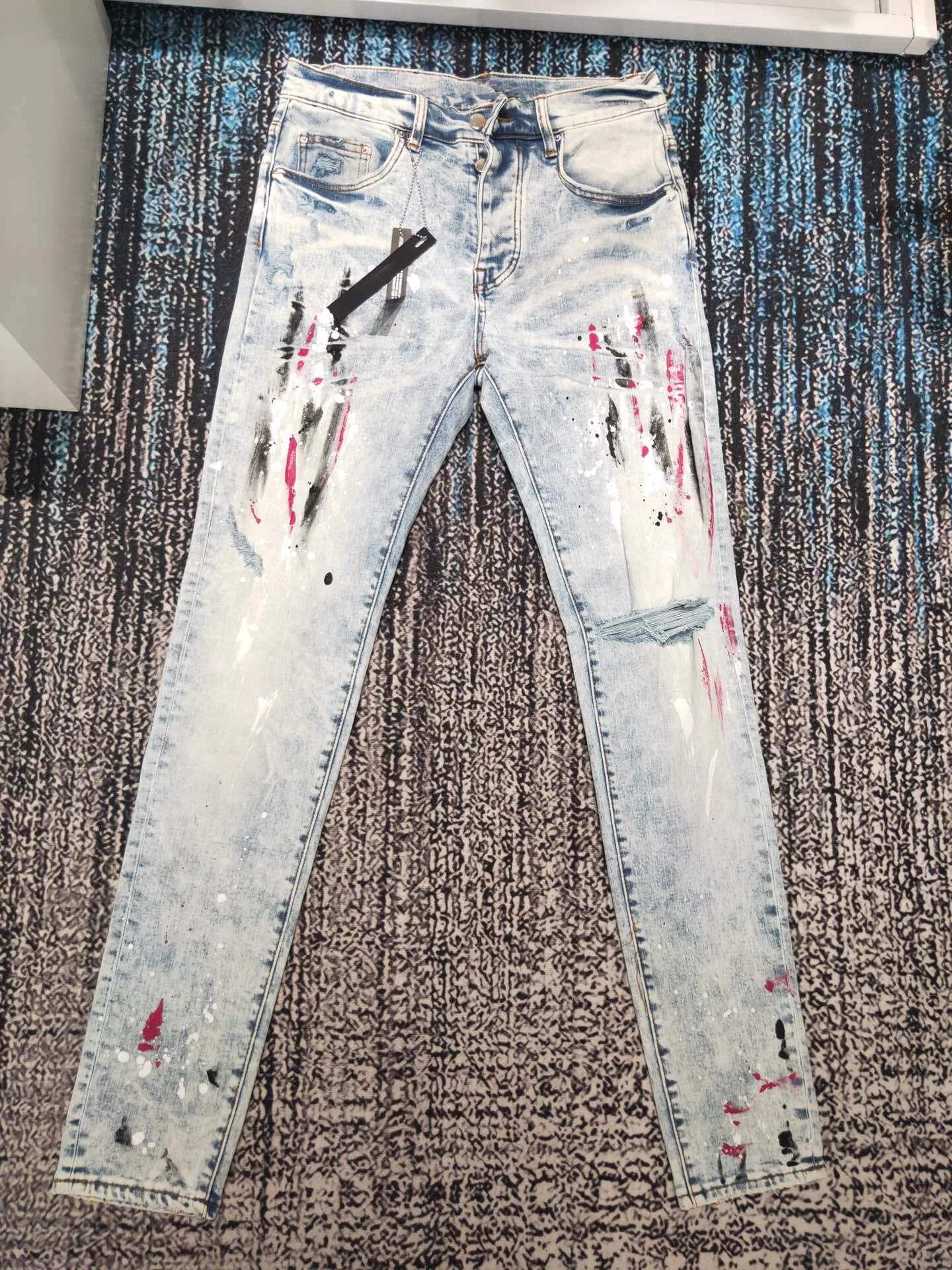 Discounted men new paints splattered distressed skinny jeans