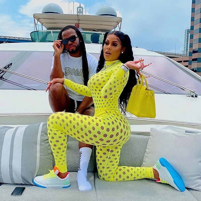 

2021 Hollow Out Jumpsuits Women Turtleneck Sexy Net Plaid Hole Skinny Elastic Club Streetwear Solid Rompers Female Outfits