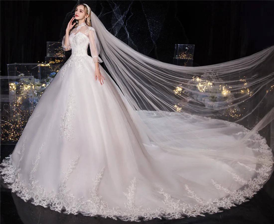 Роскошное кружевное свадебное платье с вышивкой винтажное высоким воротом и