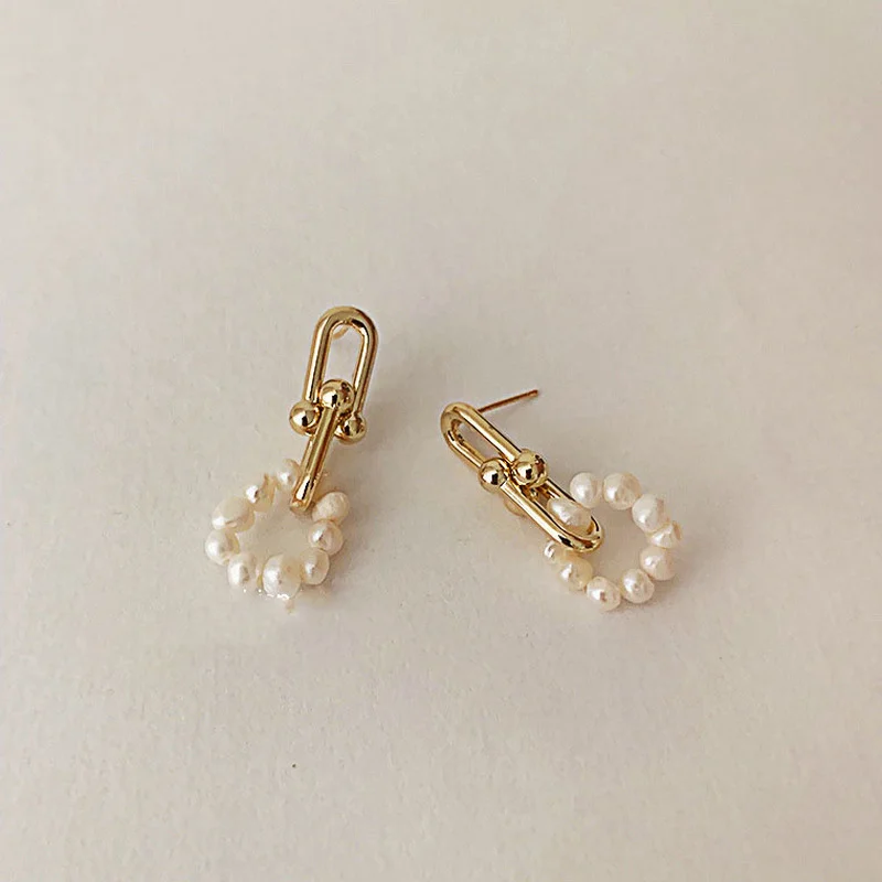 

Серьги-подвески из натурального жемчуга золотого цвета с пряжкой