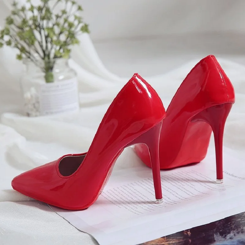 

2021 spring new stilettos wedding shoes female pointed shallow mouth large size red outsole banquet dress single shoes
