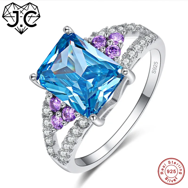 Кольцо женское из серебра 925 пробы с мистическим радужным и голубым топазом