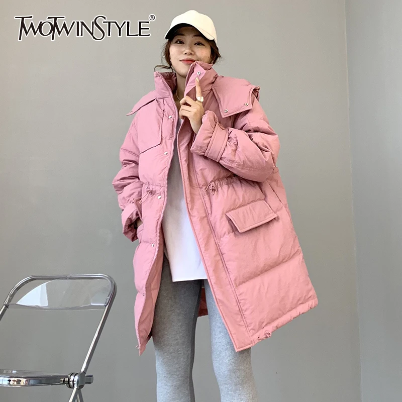 

TWOTWINSTYLE Patchwork Zipper Down Jacket Female Stand Collar Long Sleeve With Hat High Waist Loose Women's Winter Coat 2021