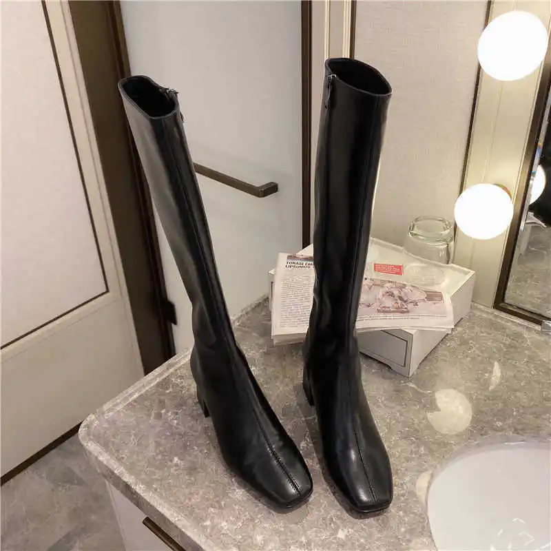 

Boots children's middle tube boots small not over knee chivalry boots new high tube Plush thick heeled high heeled boots in