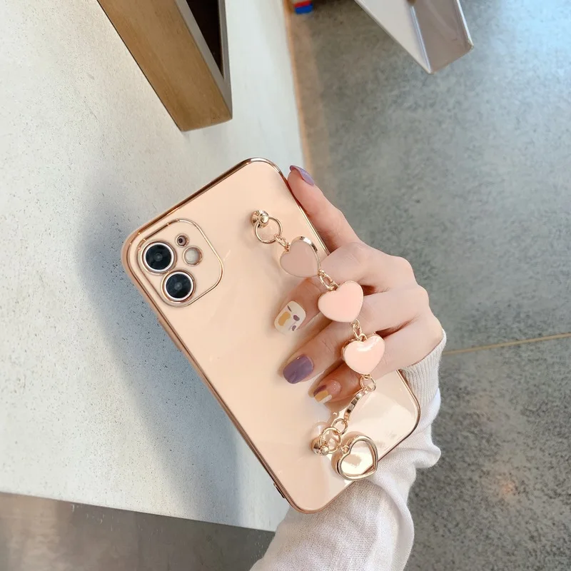 

Holo Heart Bracelet Hand Holder Cover for iPhone 12 11 Pro Max Luxury Plated Gold Strap Cases for iPhone 8 Plus 7 XR XS X SE