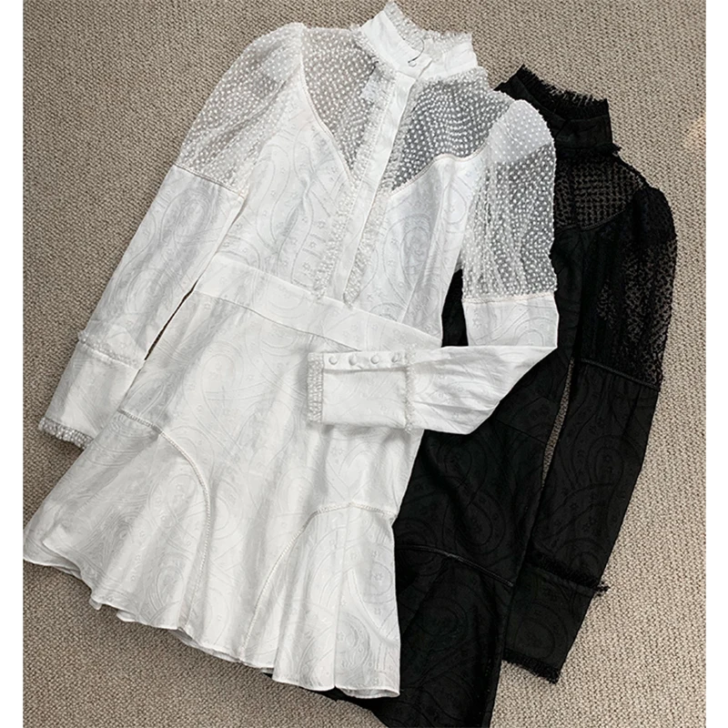 Small stand-up collar lotus leaf wave dot mesh stitching black and white two-tone waist slimming dress |