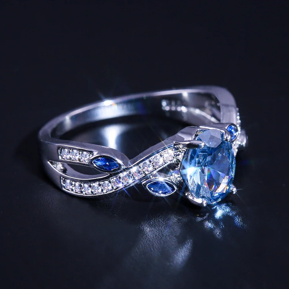 

JK Cirrus Twist Winding Design With Cute Leaves Women Rings With Brilliant Sky Blue Cubic Zircon Stone Female Jewelry Ring