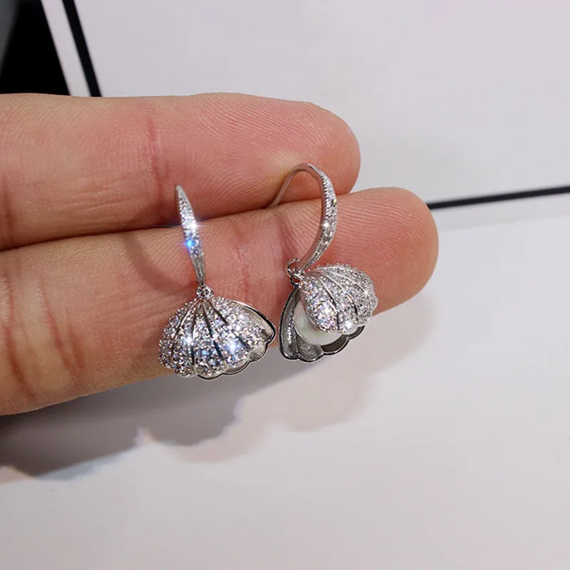 Серьги подвески с металлическим корпусом изысканные серьги блестящими